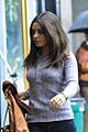 kunis-umbrella-day