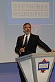 clooney-deutscher