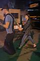dakota-johnson-chris-martin-holding-hands