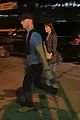 dakota-johnson-chris-martin-holding-hands