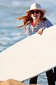 sacha-isla-natalie-benjamin-surfing