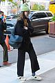 dakota-johnson-wears-a-green-beanie-in-nyc