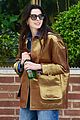 anne-hathaway-cab-gold-jacket-manhattan