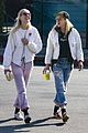 kristen-stewart-dylan-meyer-laughing-matching-outfits
